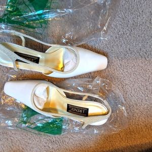 Pearl slings back white pumps